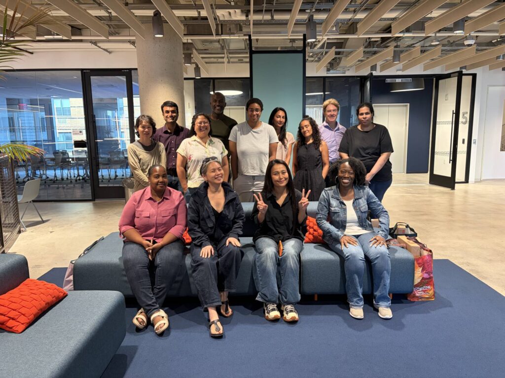 15 AI developer scholarship recipients gather for a group photo at Civic Hall in New York City.
